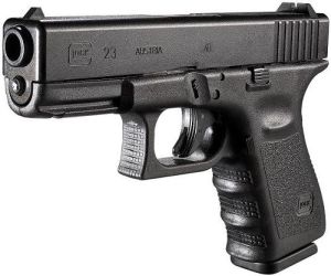 a glock 23 handgun 